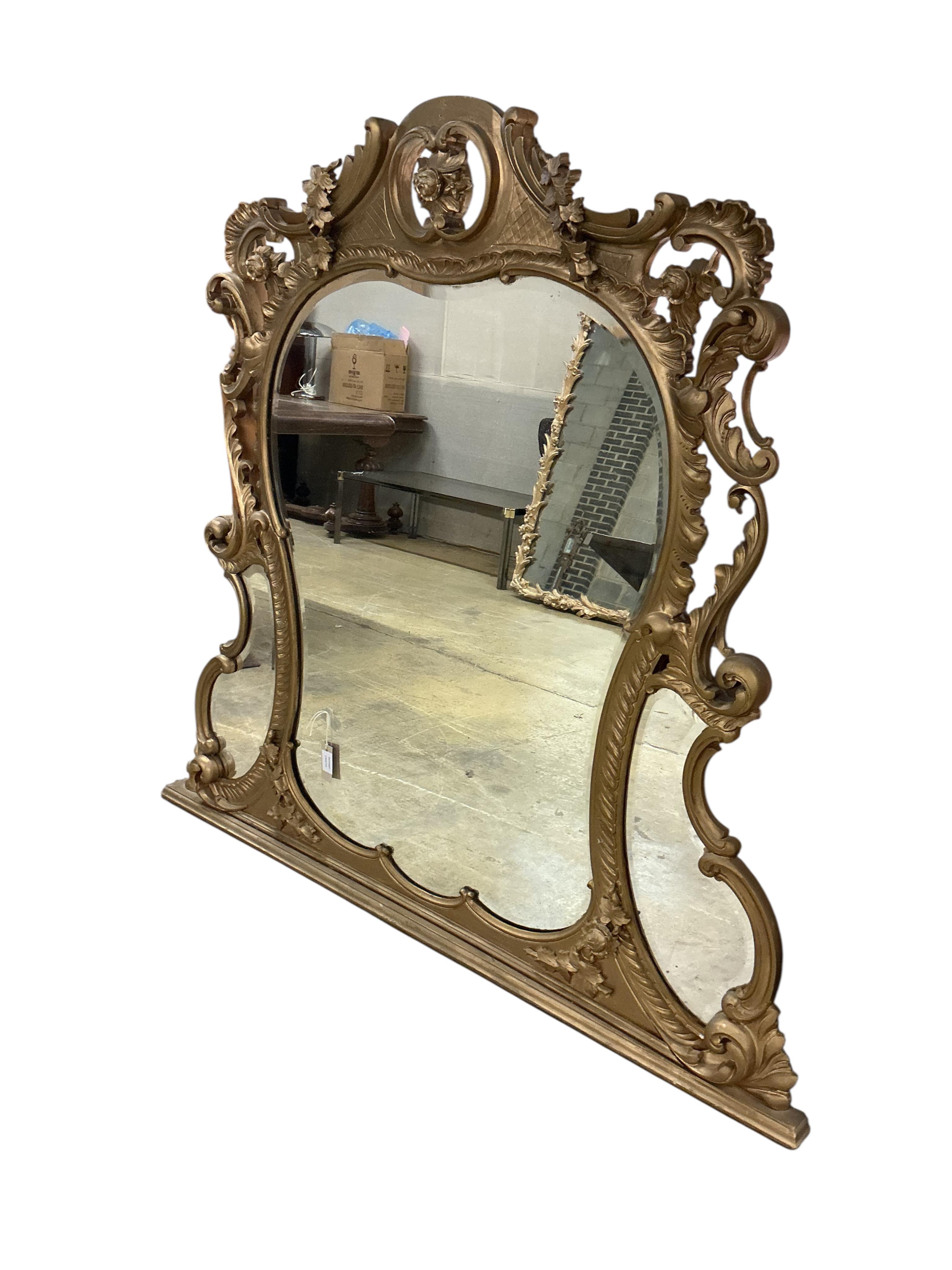 A Victorian giltwood and composition overmantel mirror with bevelled plates, later gilt painted, width 142cm, height 130cm
